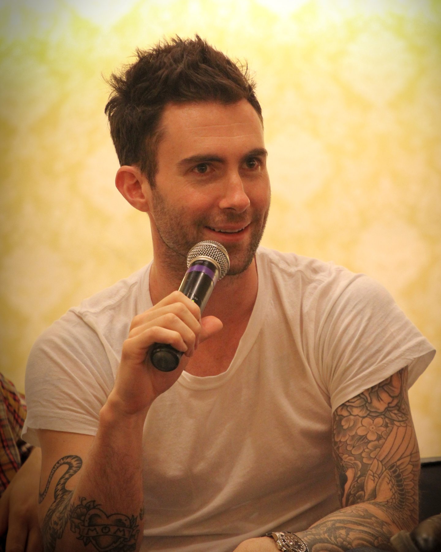 Adam Levine performing