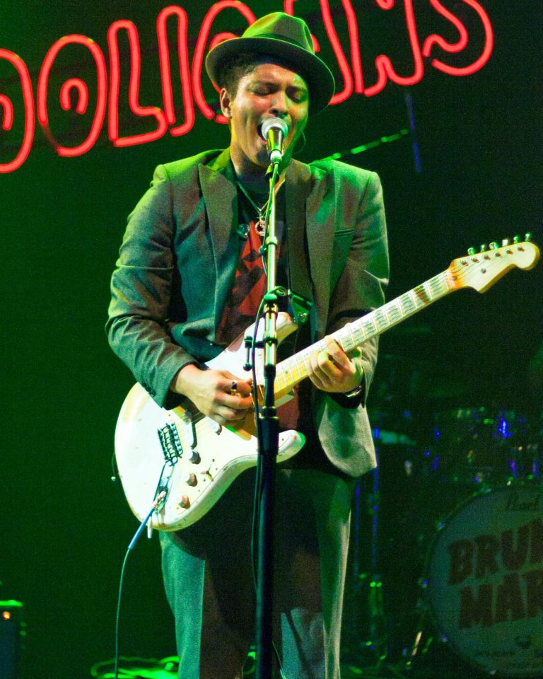 Bruno Mars performing on stage