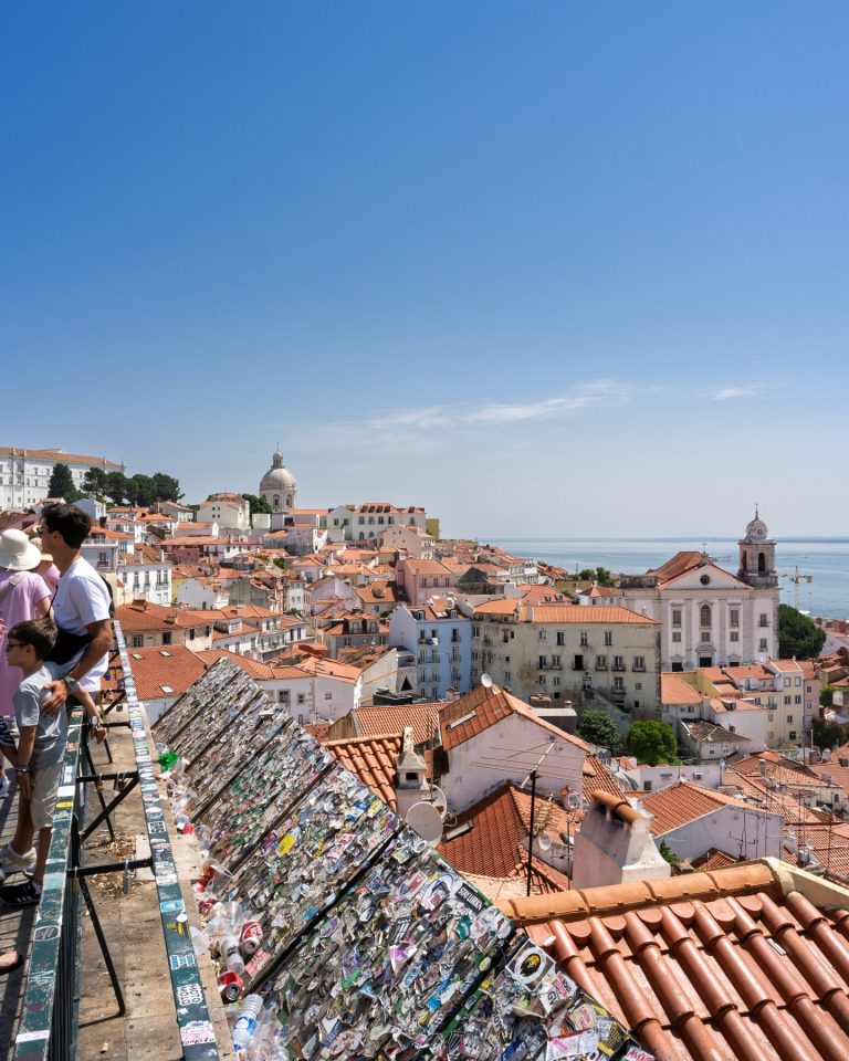 Red-tiled rooftops of Lisbon's Alfama district above the river